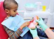 young boy at the dentist receiving sealants for kids