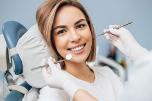 woman about to get dental bonding woodlands tx