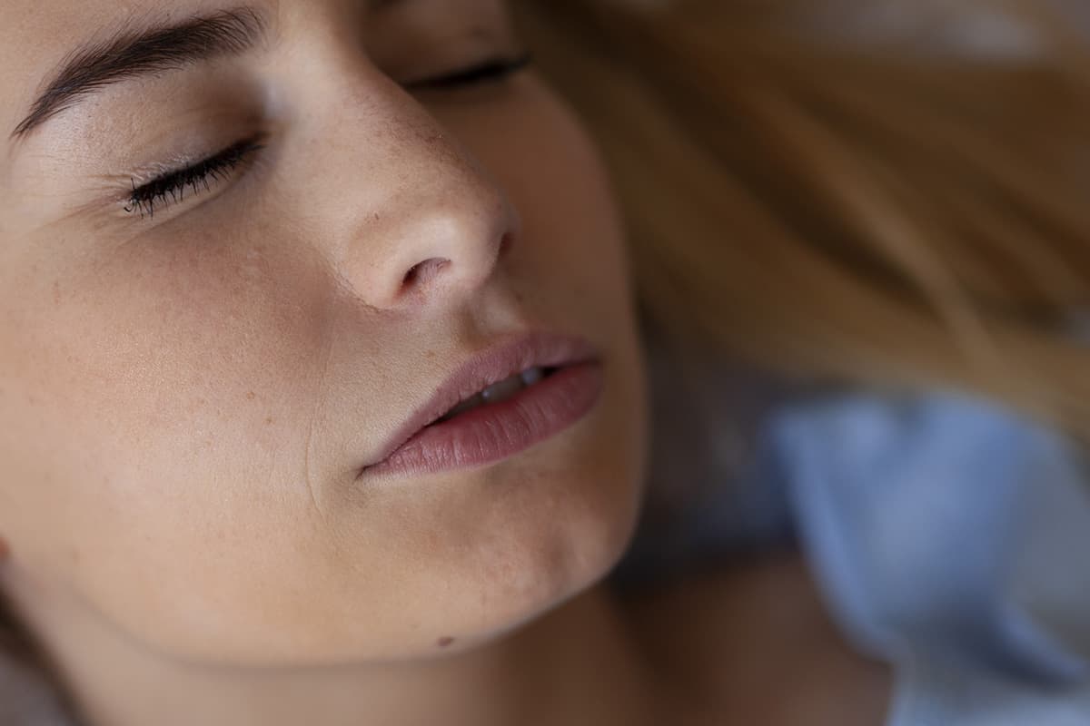 a woman grinding teeth in her sleep