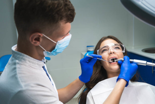 root-canal an endodontist performs a root canal oral surgery